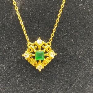 Gold adjustable necklace. Look for matching rings and earrings!